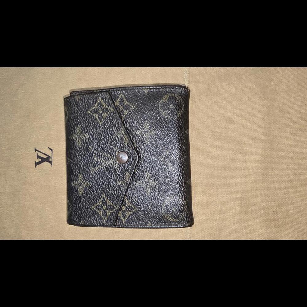 Louis Vuitton Monogram Double Snap Wallet